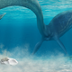 Artist’s reconstruction showing a mosasaur mother depositing a soft-shelled egg on the seafloor.